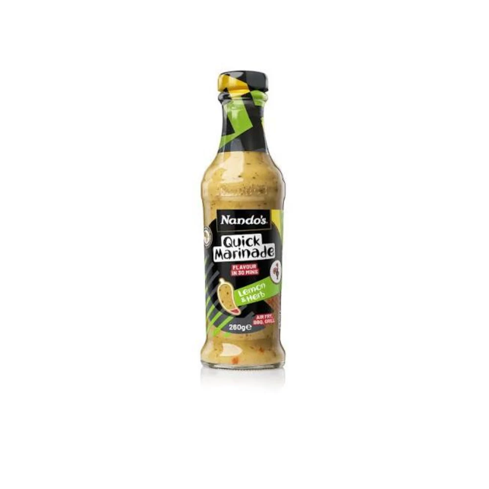 1100b1ce-81d5-4650-8e0e-543a55c49665.webp Nando's PERi-PERi Quick Marinade Lemon & Herb Extra Mild (260g) - Image 1